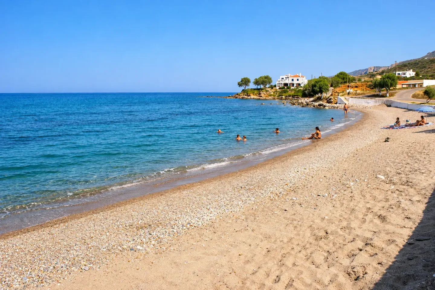 Sandy beach along a calm bay on Kythira