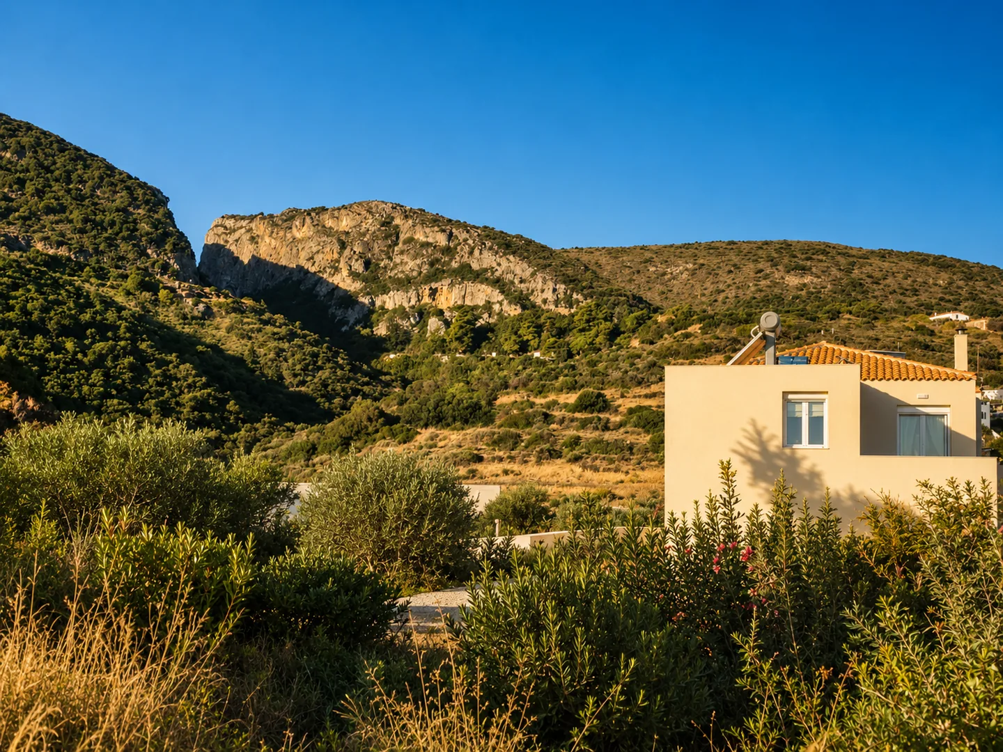 The house with the Kythira mountains behind